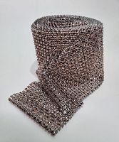 Стразы-обманки на полотне. Ширина 12 см, длина 9 метров. Цвет бронза. Вес 700 гр.